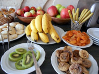 Breakfast with fruits, homemade pastries and cookies