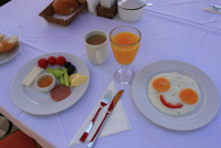 Selection of eggs menu and local bread at breakfast